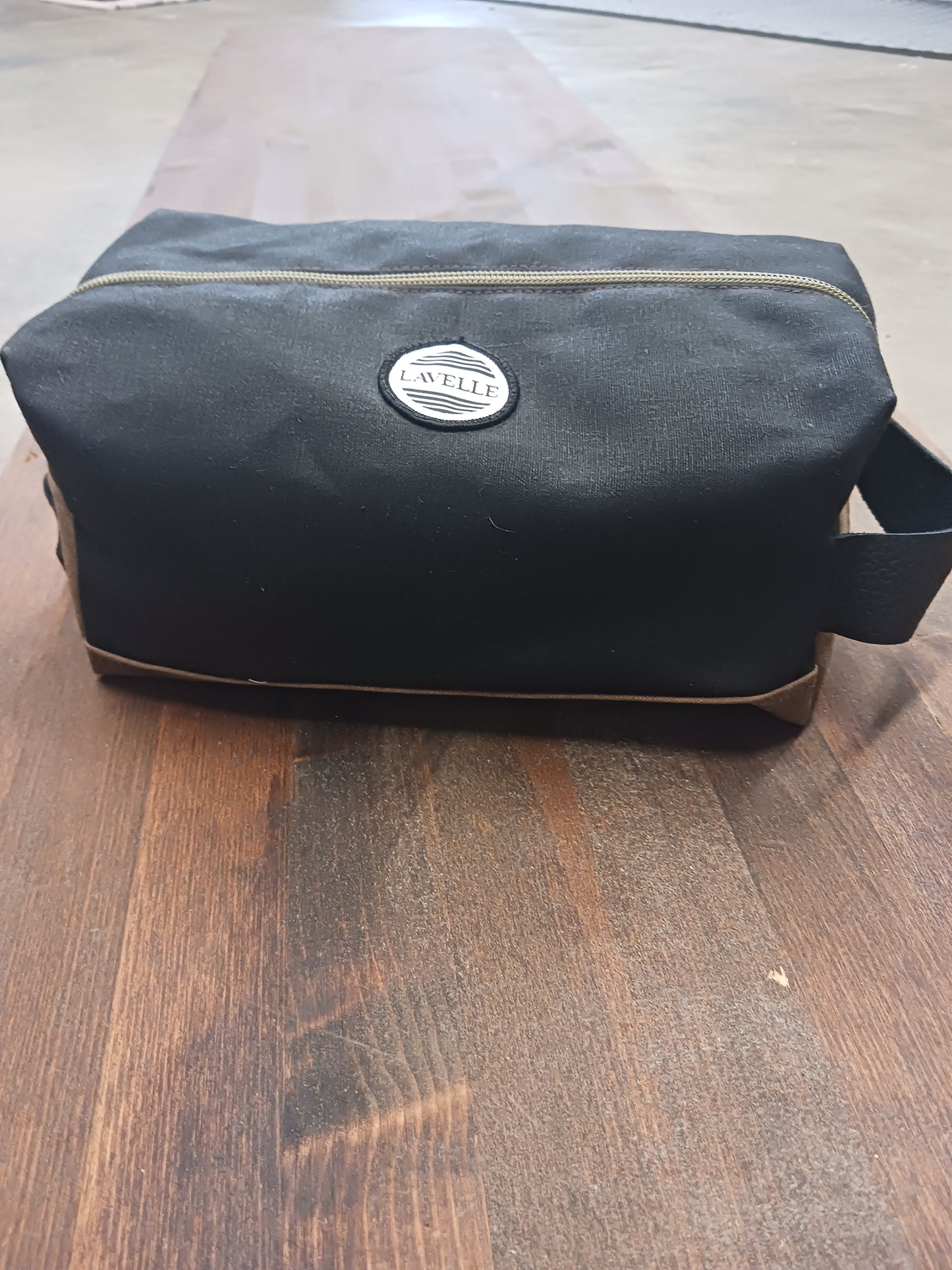 Black and Field tan Waxed canvas dopp kit.