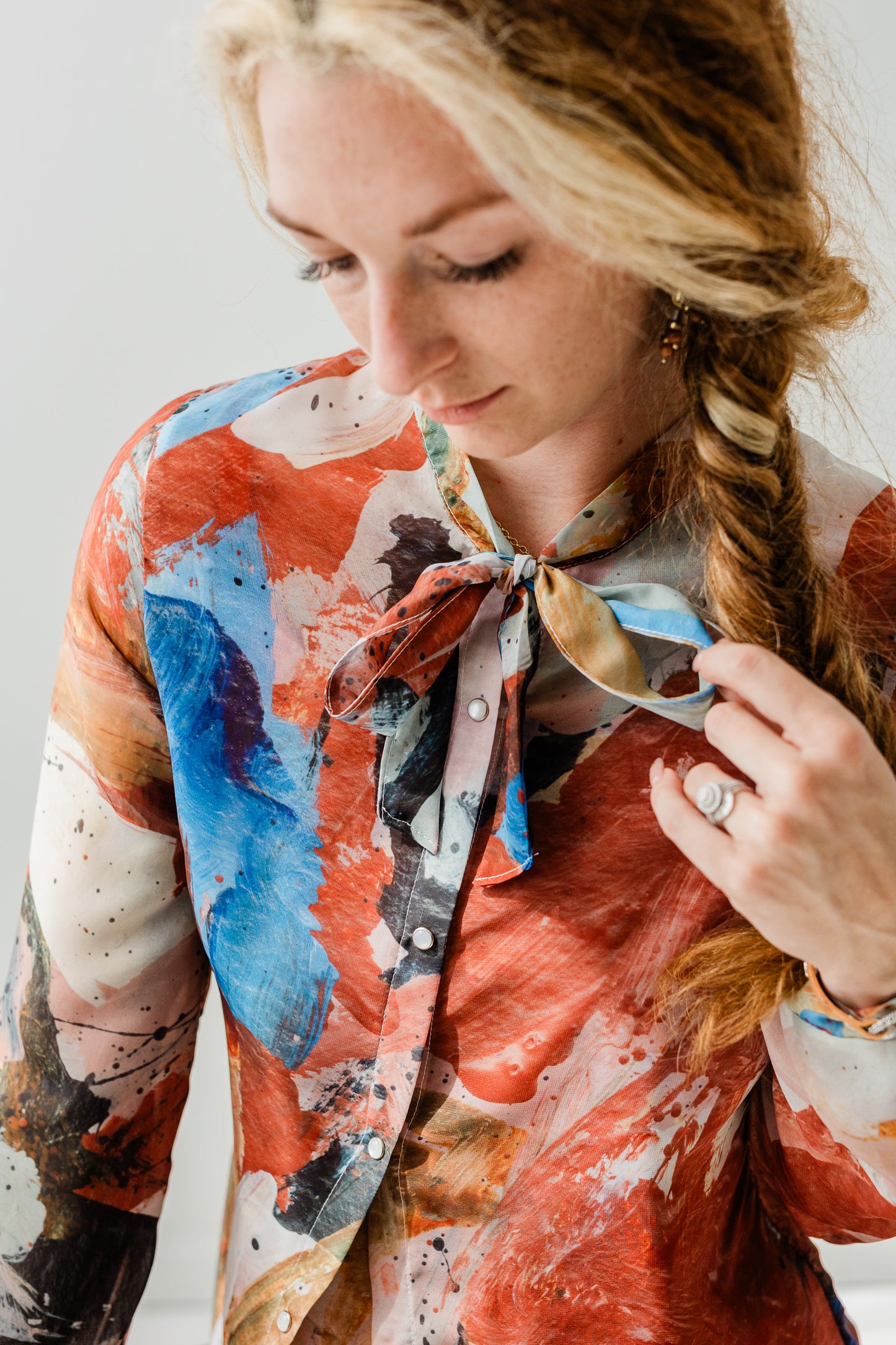 Silk chiffon tie blouse in vegetable dyed Marcy Parks print with pearl snaps