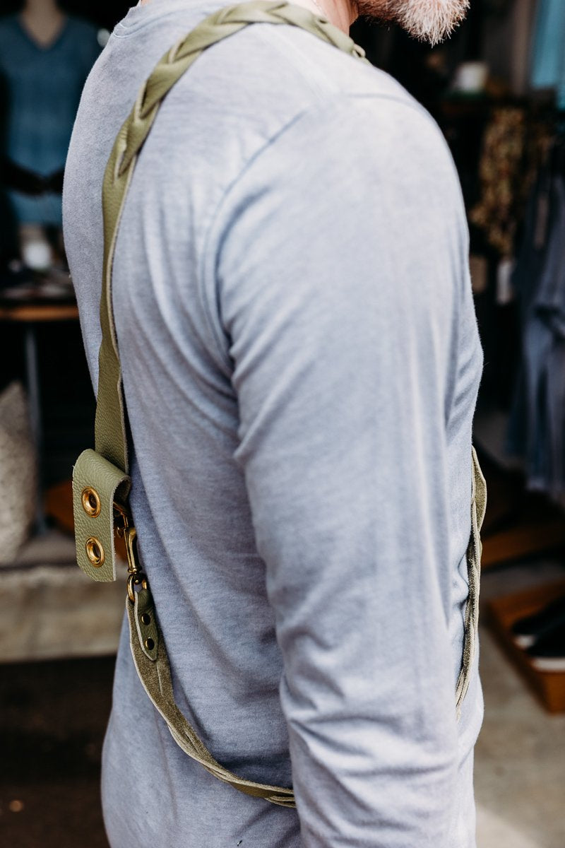 Olive green leather/crackled treated leather crossbody holster style zippered pouch