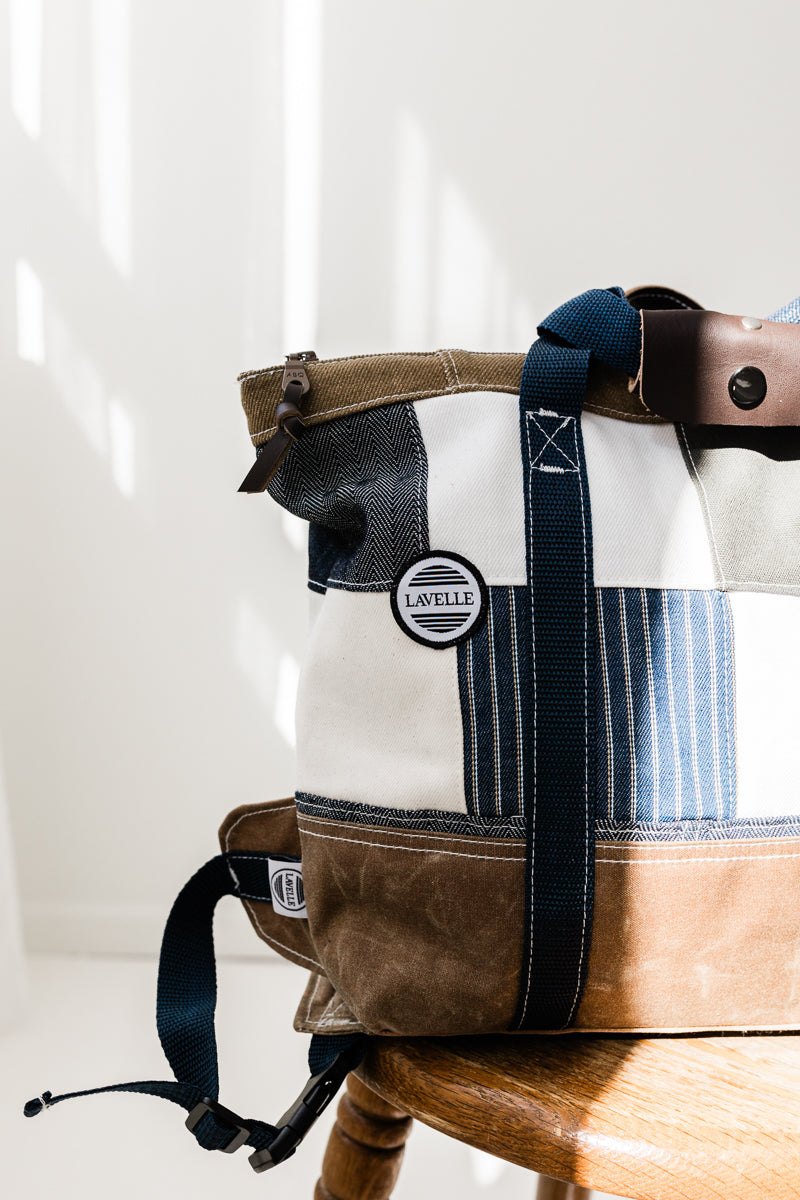 Backpack patchwork jeans and store wax, leather straps