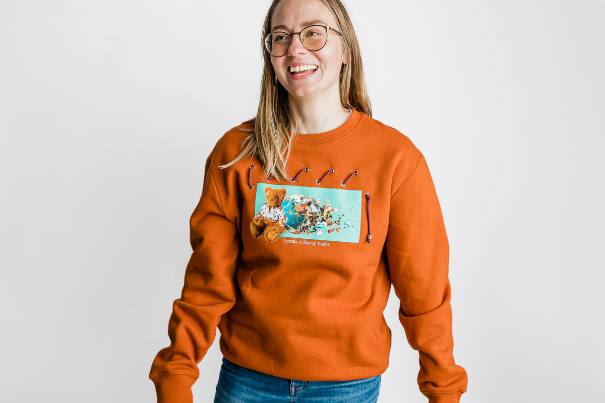 Lavelle x Marcy Parks Organic/Recycled Woven Sweatshirt with Teddy Lavelle Print, Woven ripcord detail and comfort fit. (Rust)