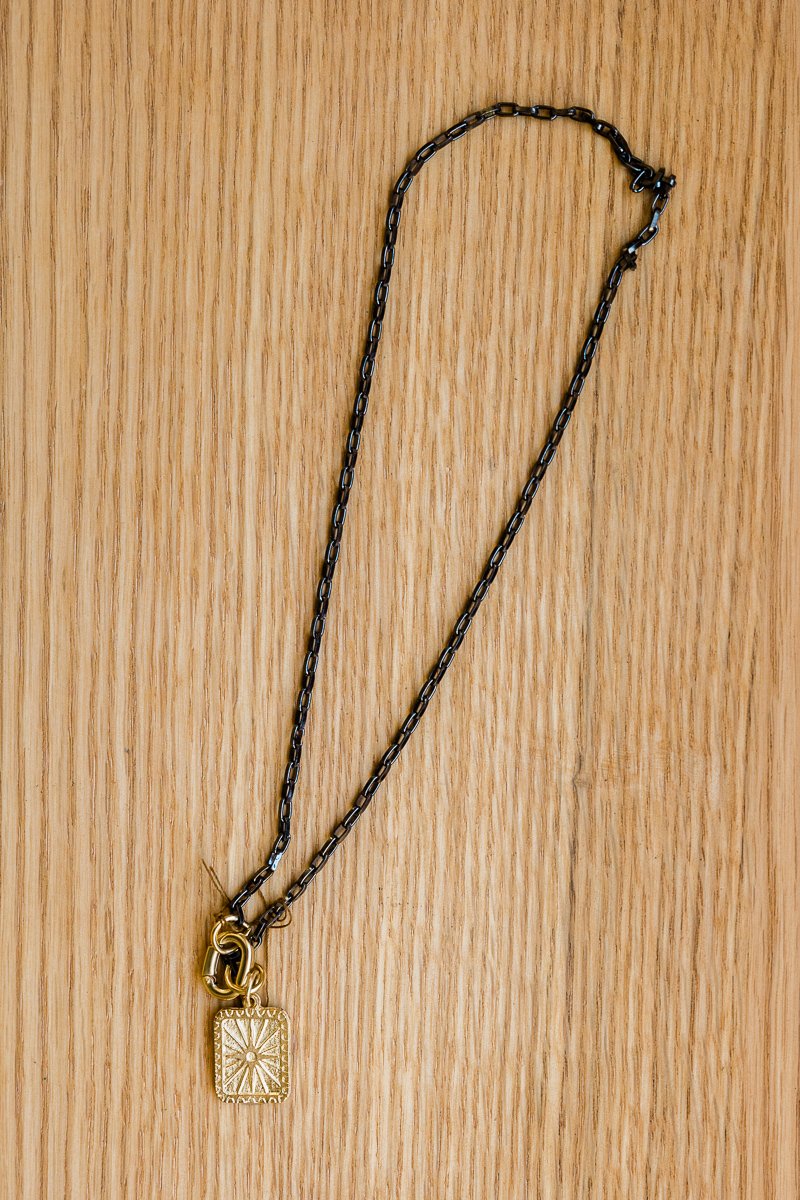 Oxidized Sterling silver chain with 14K gold vermeil clasp and sunburst coin